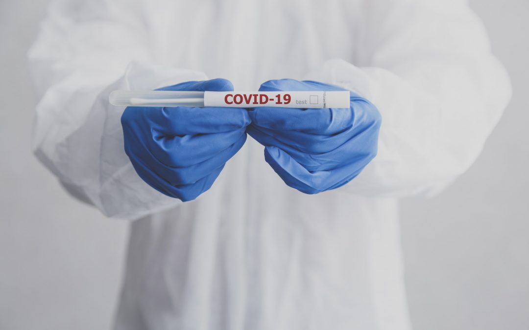 Laboratory technician hold coronavirus test tube for COVID-19 test